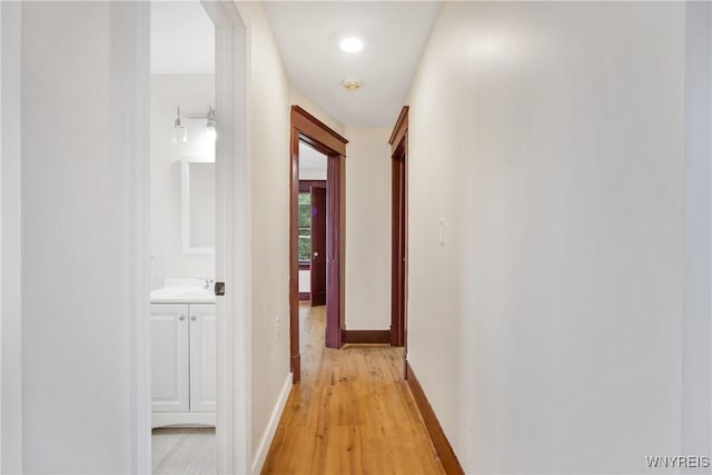 153 Hinman Ave, Buffalo, NY 14216 - corridor featuring light wood-style flooring and baseboards