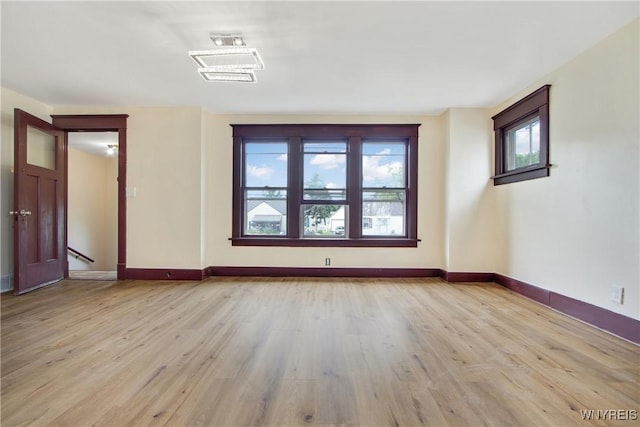 153 Hinman Ave, Buffalo, NY 14216 - spare room featuring plenty of natural light and light wood finished floors