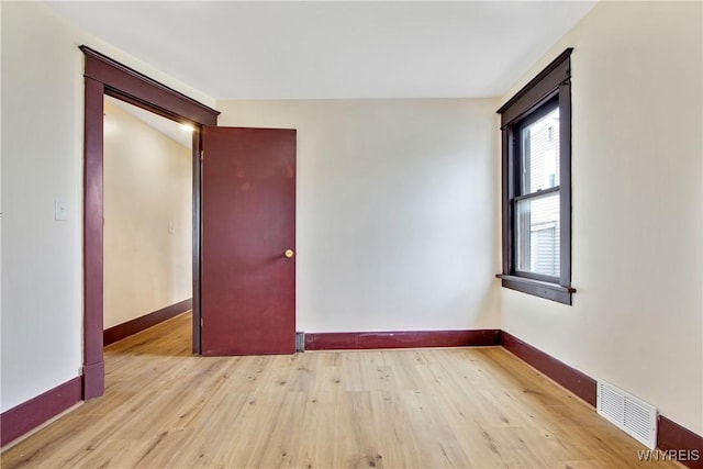 153 Hinman Ave, Buffalo, NY 14216 - spare room featuring light wood-style floors and baseboards