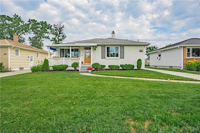 24 Ceil Dr, Cheektowaga, NY 14227 - view of front of property with a front lawn, a porch, brick siding, and a chimney