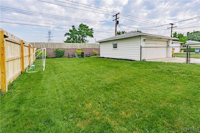 24 Ceil Dr, Cheektowaga, NY 14227 - fenced backyard featuring a garage
