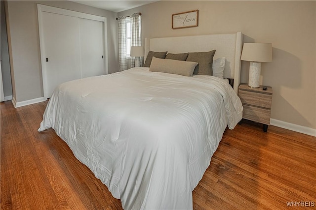 24 Ceil Dr, Cheektowaga, NY 14227 - bedroom with wood finished floors and a closet
