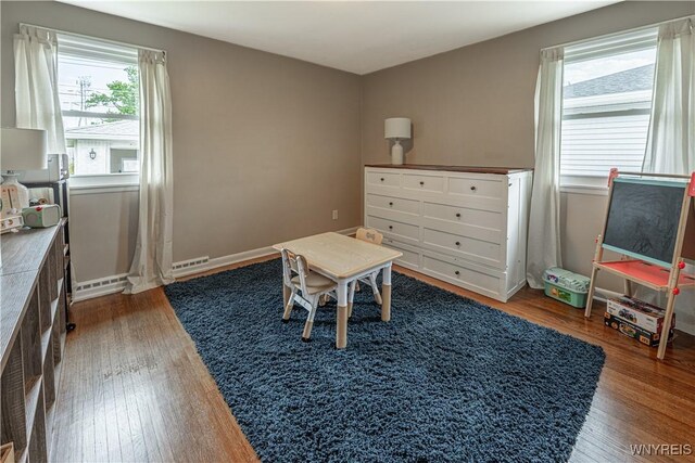 24 Ceil Dr, Cheektowaga, NY 14227 - playroom with dark wood-style floors