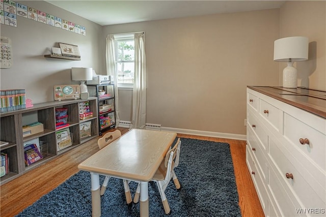 24 Ceil Dr, Cheektowaga, NY 14227 - game room featuring light wood-style flooring and baseboards