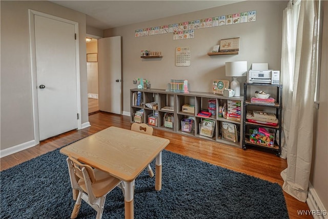 24 Ceil Dr, Cheektowaga, NY 14227 - game room with wood finished floors and baseboards
