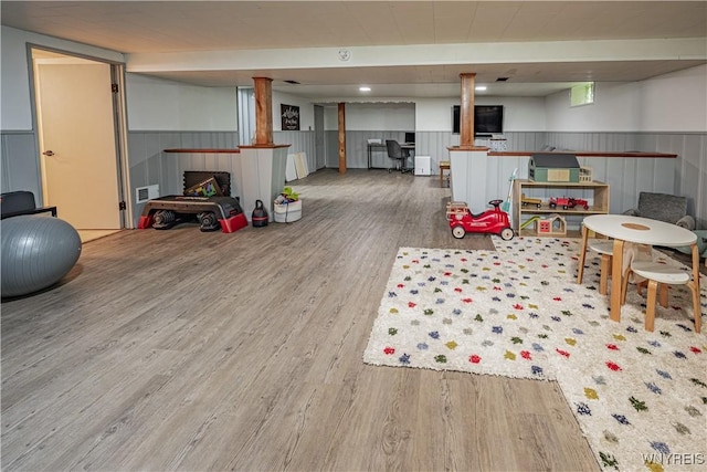 24 Ceil Dr, Cheektowaga, NY 14227 - rec room with wood finished floors and a wainscoted wall
