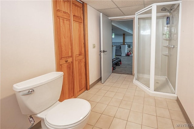 24 Ceil Dr, Cheektowaga, NY 14227 - bathroom featuring a stall shower, tile patterned flooring, and a drop ceiling
