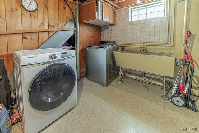24 Ceil Dr, Cheektowaga, NY 14227 - laundry area with cabinet space, light flooring, and washer and dryer