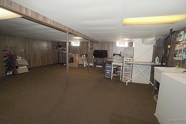 4 Windtree Ln, West Seneca, NY 14224 - basement with a paneled ceiling, washer / dryer, and wooden walls