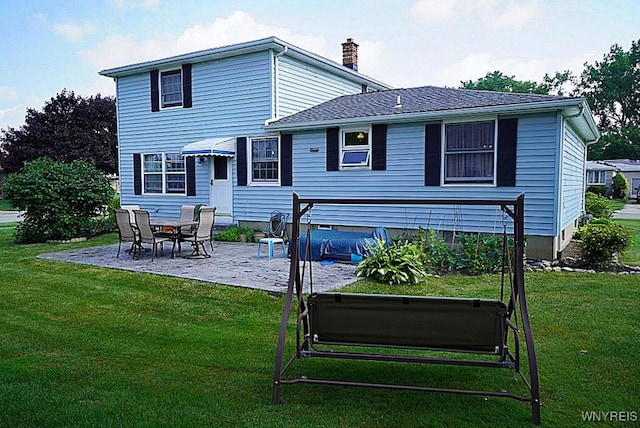 4 Windtree Ln, West Seneca, NY 14224 - rear view of property featuring a patio, a lawn, and a chimney