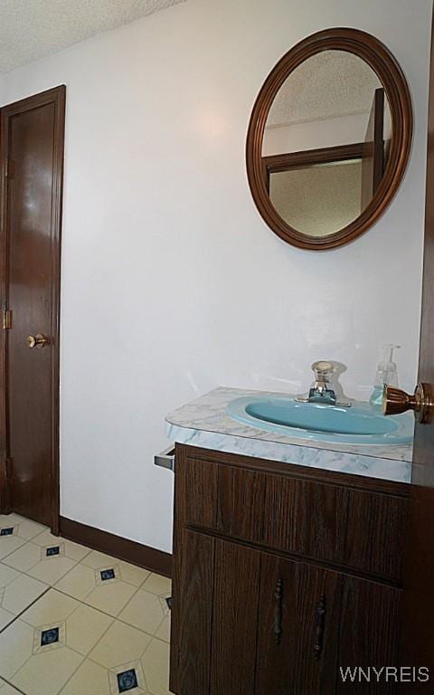 4 Windtree Ln, West Seneca, NY 14224 - bathroom featuring vanity and a textured ceiling