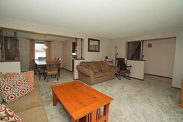 4 Windtree Ln, West Seneca, NY 14224 - carpeted living room featuring a chandelier and a textured ceiling