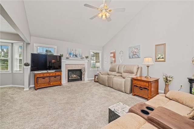 65 Sotheby Dr, Greece, NY 14626 - living room featuring light carpet, high vaulted ceiling, ceiling fan, and a tile fireplace