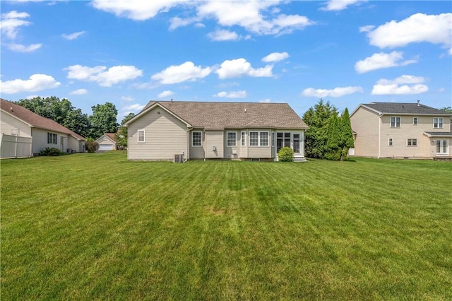 65 Sotheby Dr, Greece, NY 14626 - back of house featuring a lawn