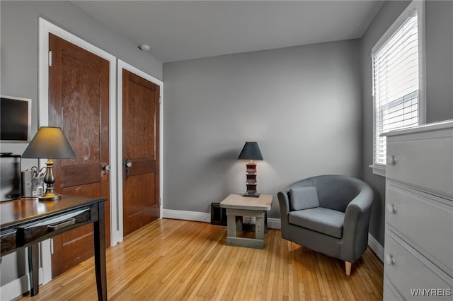 1871 Eggert Rd, Amherst, NY 14226 - sitting room featuring light wood-type flooring and baseboards
