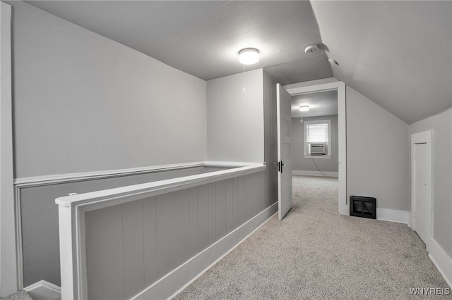 1871 Eggert Rd, Amherst, NY 14226 - corridor with cooling unit, carpet, and vaulted ceiling