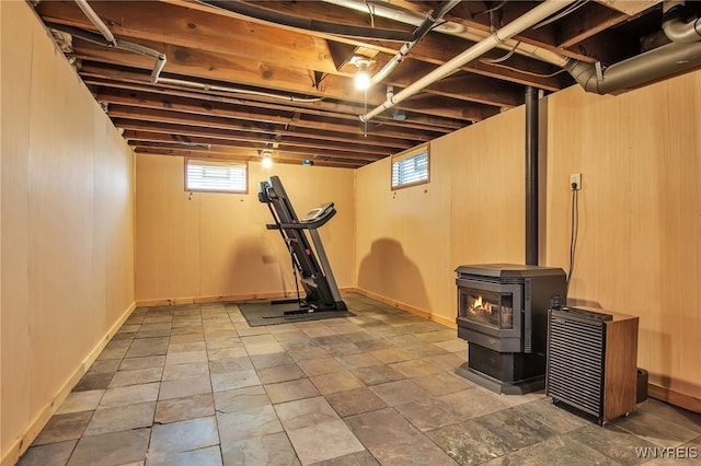 1871 Eggert Rd, Amherst, NY 14226 - workout room with a wood stove and plenty of natural light