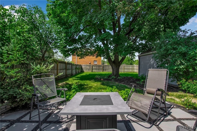 1871 Eggert Rd, Amherst, NY 14226 - fenced backyard with a patio area
