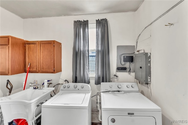 302 Midland Ave, Tonawanda, NY 14223 - laundry room featuring cabinet space, independent washer and dryer, and electric panel
