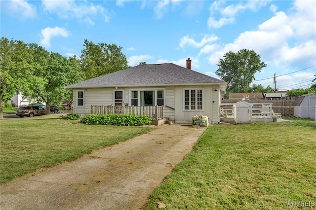 302 Midland Ave, Tonawanda, NY 14223 - back of house featuring a chimney and a shingled roof