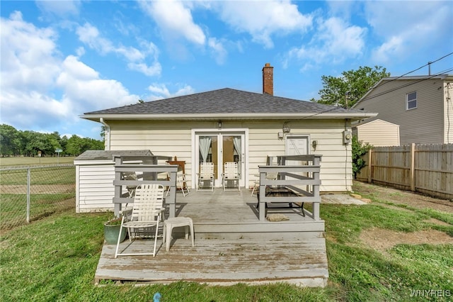 302 Midland Ave, Tonawanda, NY 14223 - back of house with a wooden deck, a fenced backyard, a chimney, and french doors