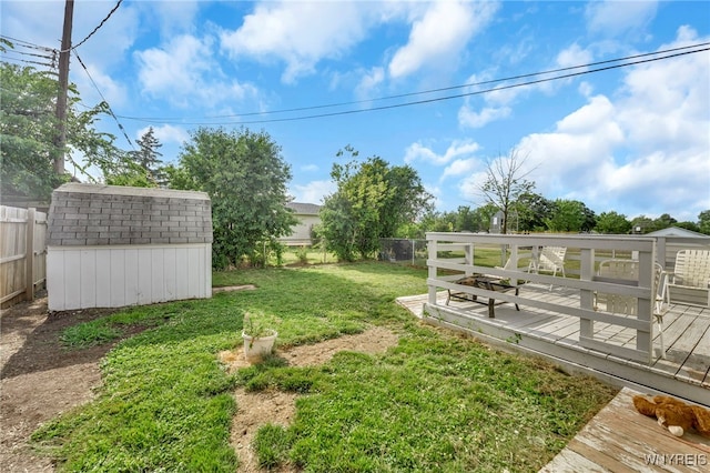302 Midland Ave, Tonawanda, NY 14223 - fenced backyard featuring a shed and a wooden deck