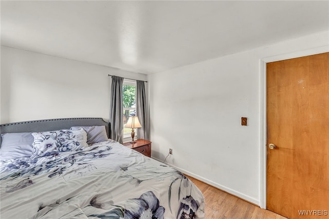 302 Midland Ave, Tonawanda, NY 14223 - bedroom featuring light wood-style flooring and baseboards