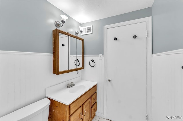 302 Midland Ave, Tonawanda, NY 14223 - bathroom featuring a wainscoted wall and vanity