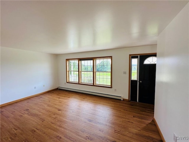 3370 Hicks Rd, Scipio, NY 13118 - entryway featuring baseboard heating and wood finished floors