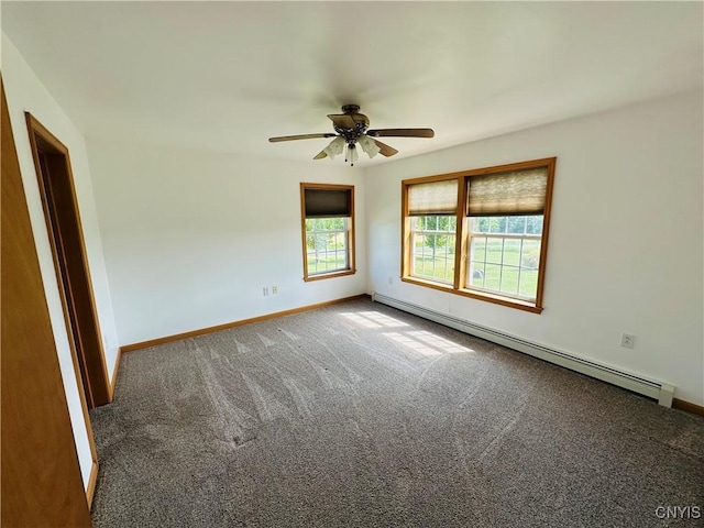 3370 Hicks Rd, Scipio, NY 13118 - carpeted spare room with a baseboard heating unit and ceiling fan