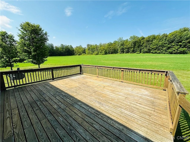 3370 Hicks Rd, Scipio, NY 13118 - wooden terrace featuring a lawn and view of wooded area