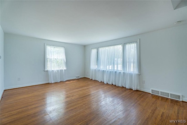 165 Kelvin Dr, Tonawanda, NY 14223 - unfurnished room with wood finished floors and a smoke detector