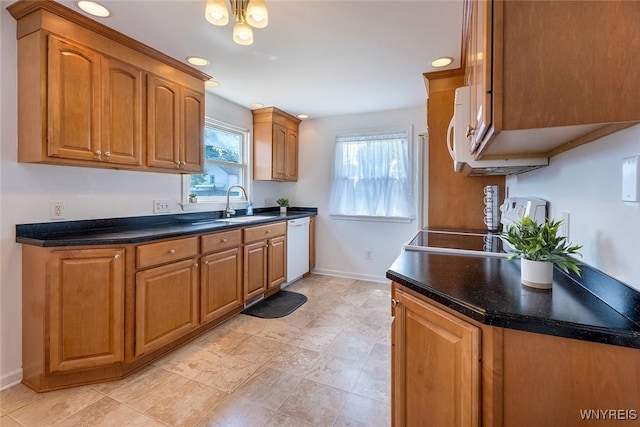 165 Kelvin Dr, Tonawanda, NY 14223 - kitchen featuring white appliances, brown cabinets, and recessed lighting