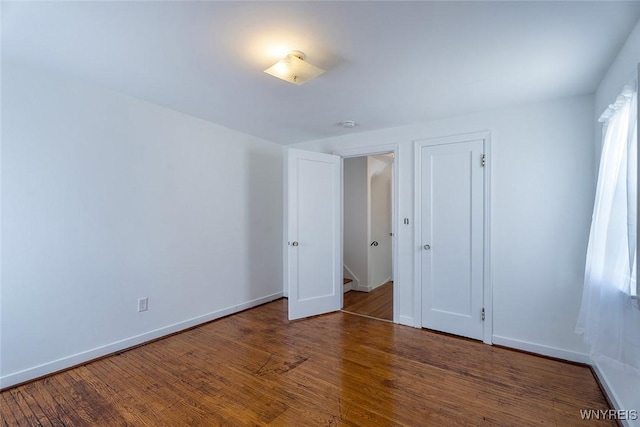 165 Kelvin Dr, Tonawanda, NY 14223 - unfurnished bedroom featuring wood finished floors and baseboards