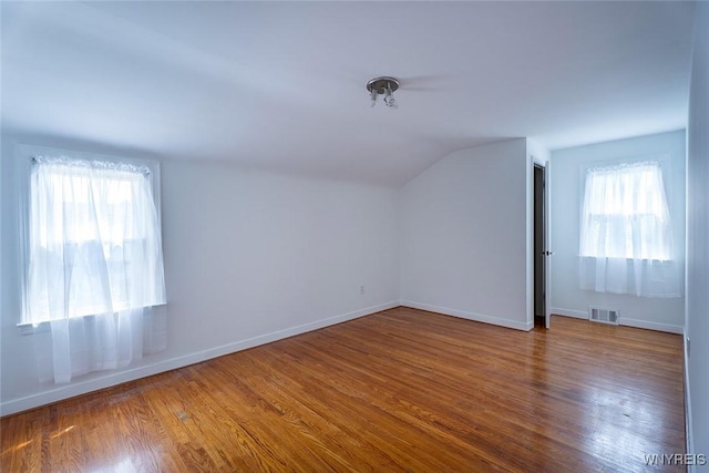 165 Kelvin Dr, Tonawanda, NY 14223 - additional living space with vaulted ceiling and wood finished floors