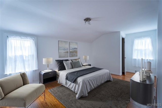 165 Kelvin Dr, Tonawanda, NY 14223 - bedroom featuring vaulted ceiling and wood finished floors