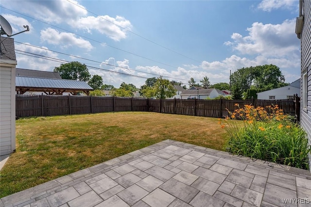 165 Kelvin Dr, Tonawanda, NY 14223 - fenced backyard featuring a patio
