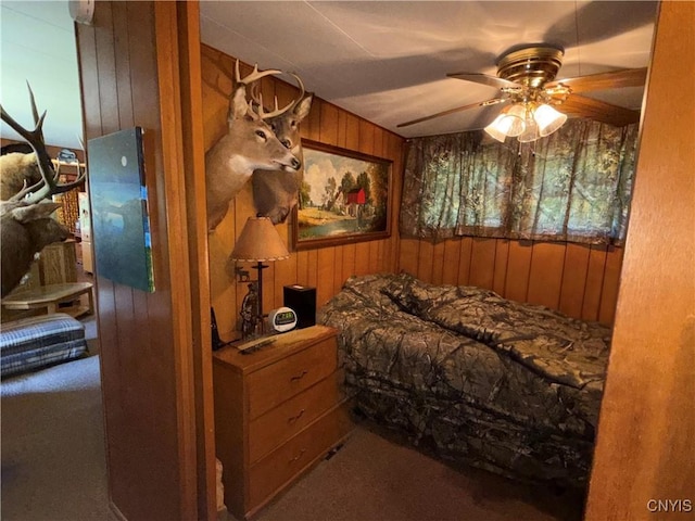 209 Lackawack Hill Rd, Wawarsing, NY 12458 - bedroom with wood walls, carpet floors, and ceiling fan