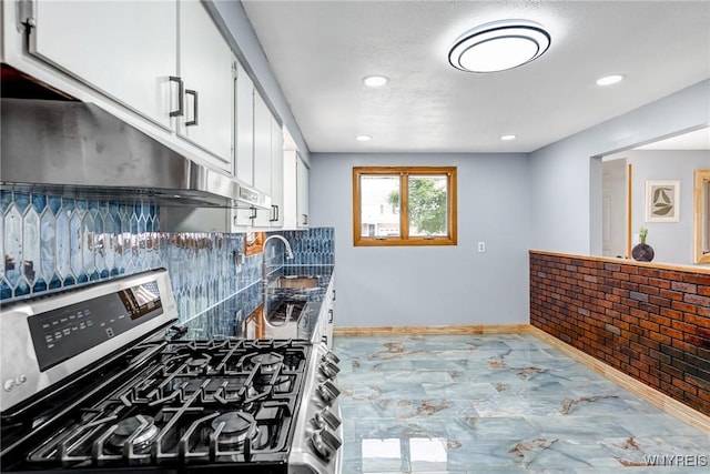 41 Dennis Ln, Cheektowaga, NY 14227 - kitchen featuring stainless steel gas stove, white cabinets, recessed lighting, tasteful backsplash, and marble finish floors