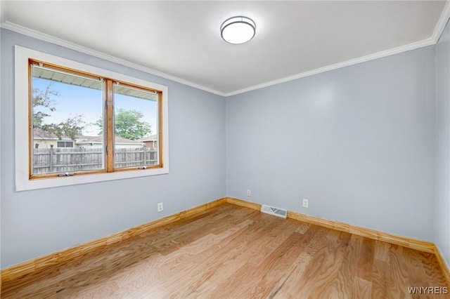 41 Dennis Ln, Cheektowaga, NY 14227 - spare room featuring wood finished floors and ornamental molding