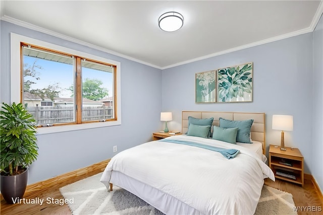 41 Dennis Ln, Cheektowaga, NY 14227 - bedroom with ornamental molding and wood finished floors
