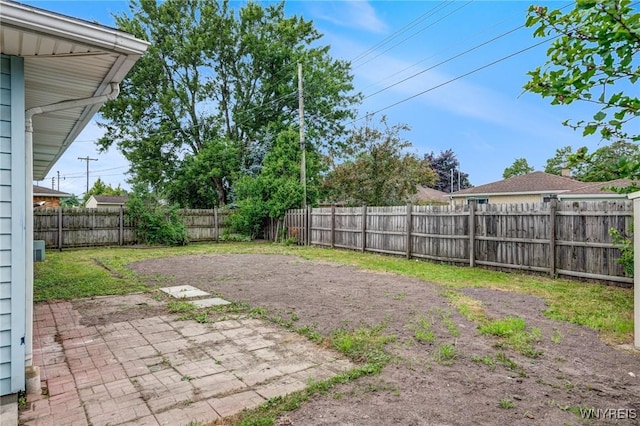 41 Dennis Ln, Cheektowaga, NY 14227 - fenced backyard with a patio