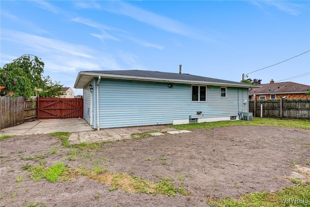 41 Dennis Ln, Cheektowaga, NY 14227 - rear view of property with a fenced backyard and a gate