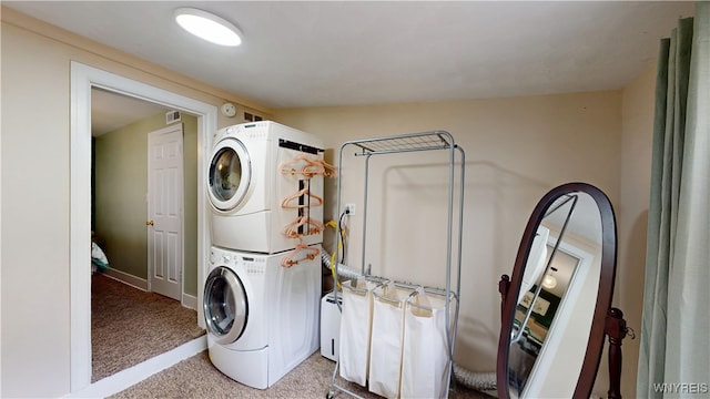 78 Heather Rd, Cheektowaga, NY 14225 - laundry room featuring stacked washer / dryer and carpet flooring