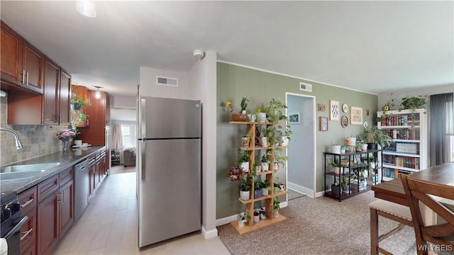 78 Heather Rd, Cheektowaga, NY 14225 - kitchen with stainless steel appliances, decorative backsplash, and dark countertops