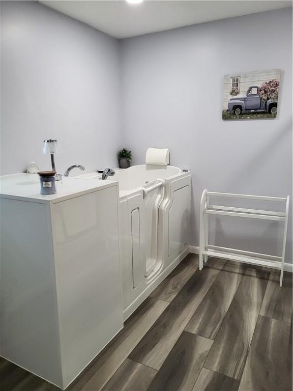 138 Dingman Hill Rd, Bainbridge, NY 13733 - laundry area featuring dark wood-style floors