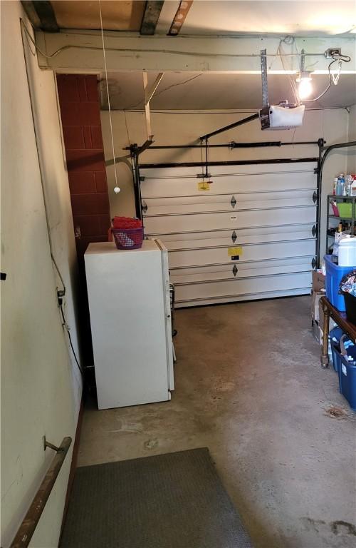138 Dingman Hill Rd, Bainbridge, NY 13733 - garage featuring washer / clothes dryer