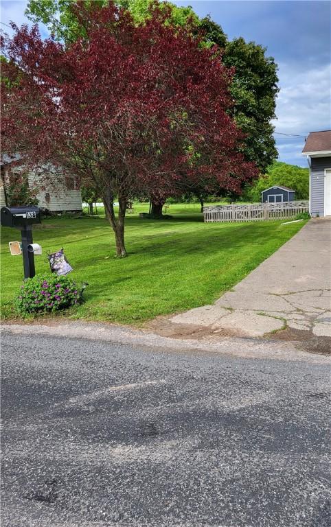 138 Dingman Hill Rd, Bainbridge, NY 13733 - view of green lawn featuring a garage