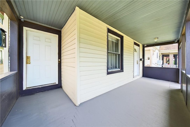 896-898 S Plymouth Ave, Rochester, NY 14608 - entrance to property featuring covered porch and a surveillance system