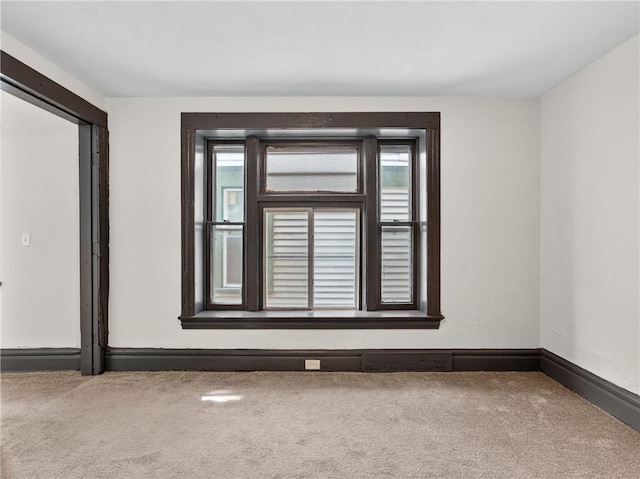 896-898 S Plymouth Ave, Rochester, NY 14608 - carpeted empty room with baseboards